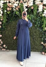 فستان مودال بأزرار مُلفتة على جانب الصدر