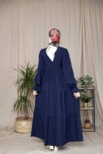 فستان استرا بخط ازرار وسطي محاط بالدانتيل