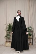 فستان استرا بخط ازرار وسطي محاط بالدانتيل